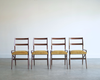 Set of Four Sculpted Walnut Dining Chairs, Italy, 1970s
